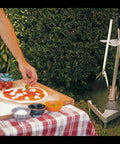 Set completo para uso doméstico, para preparar pizza que consiste en: pala, paleta, cepillo y una conveniente base triangular para mantener todas las herramientas organizadas. Paleta paletilla paleta de pizza la paleta para pizza Accesorios de cocina, Gourmitalia Pala para pizza Cortadora de pizza Gi-metal Gourmitalia.